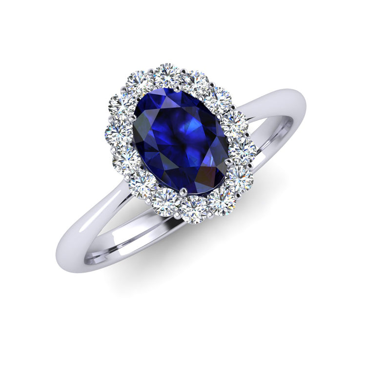 Oval sapphire and diamond cluster platinum engagement ring perspective view