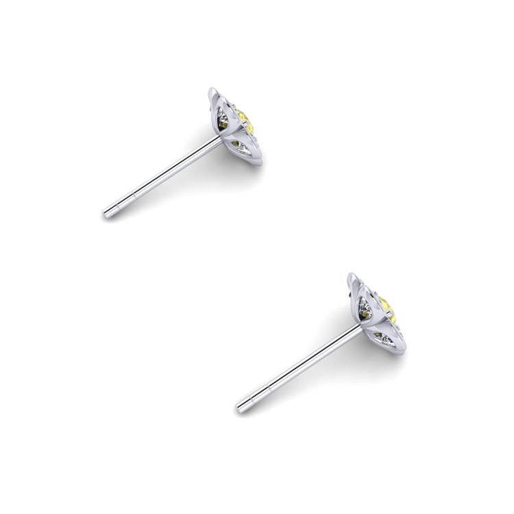 Floral yellow sapphire diamond platinum studs perspective view