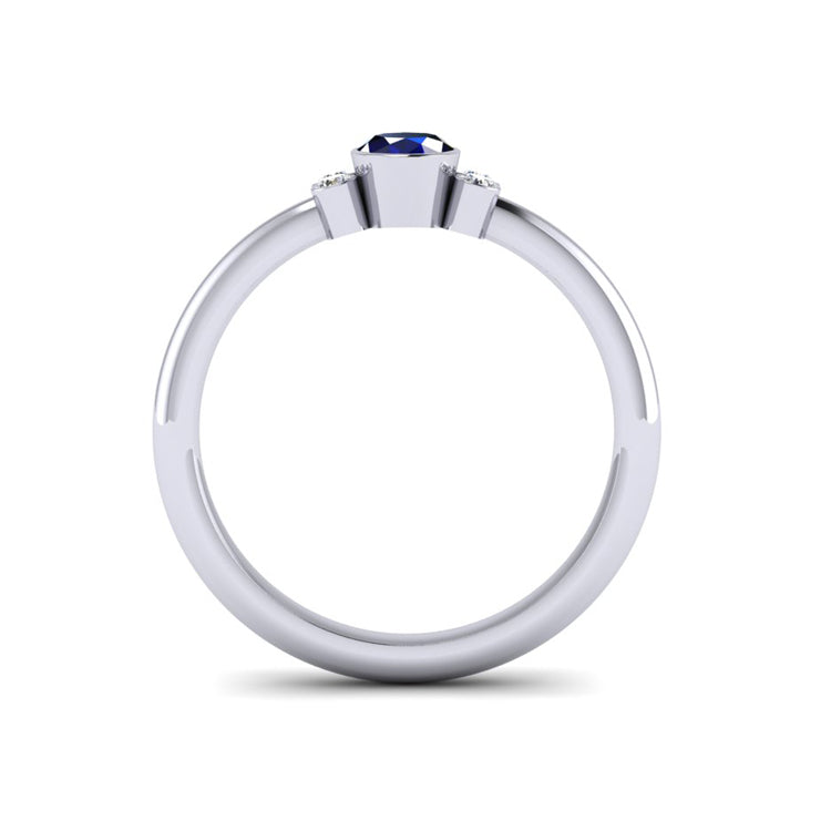 Blue Sapphire and Diamond Bezel Set Platinum Ring Through Finger View