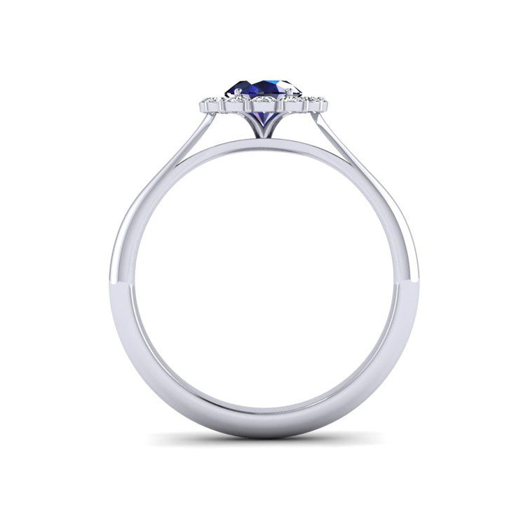 Oval sapphire and diamond cluster platinum engagement ring through finger view